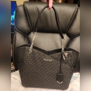 Like new,  black & silver Michael Kors purse
